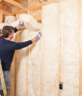 professional installer is working on internal wall insulation
