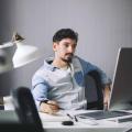 handsome-businessman-working-in-office.jpg handsome-businessman-working-in-office.jpg